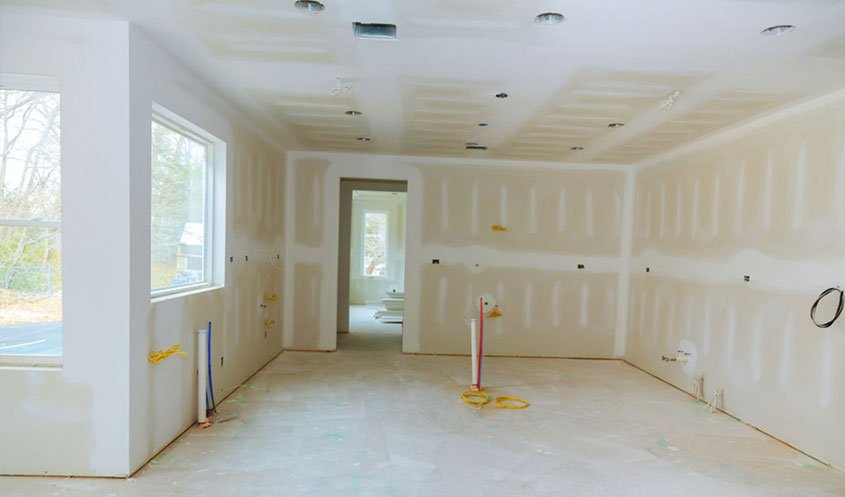 Drywall panels, joint compound, tape, and wall filler materials for smooth and durable interior walls and ceilings.